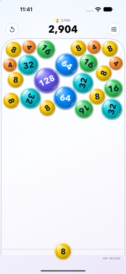 Bubbler 2.0 gameplay with colourful numbered bubbles on a light board